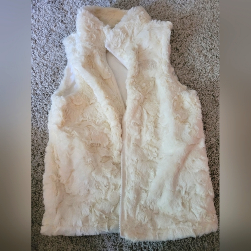 Girls North Face soft fur vest.